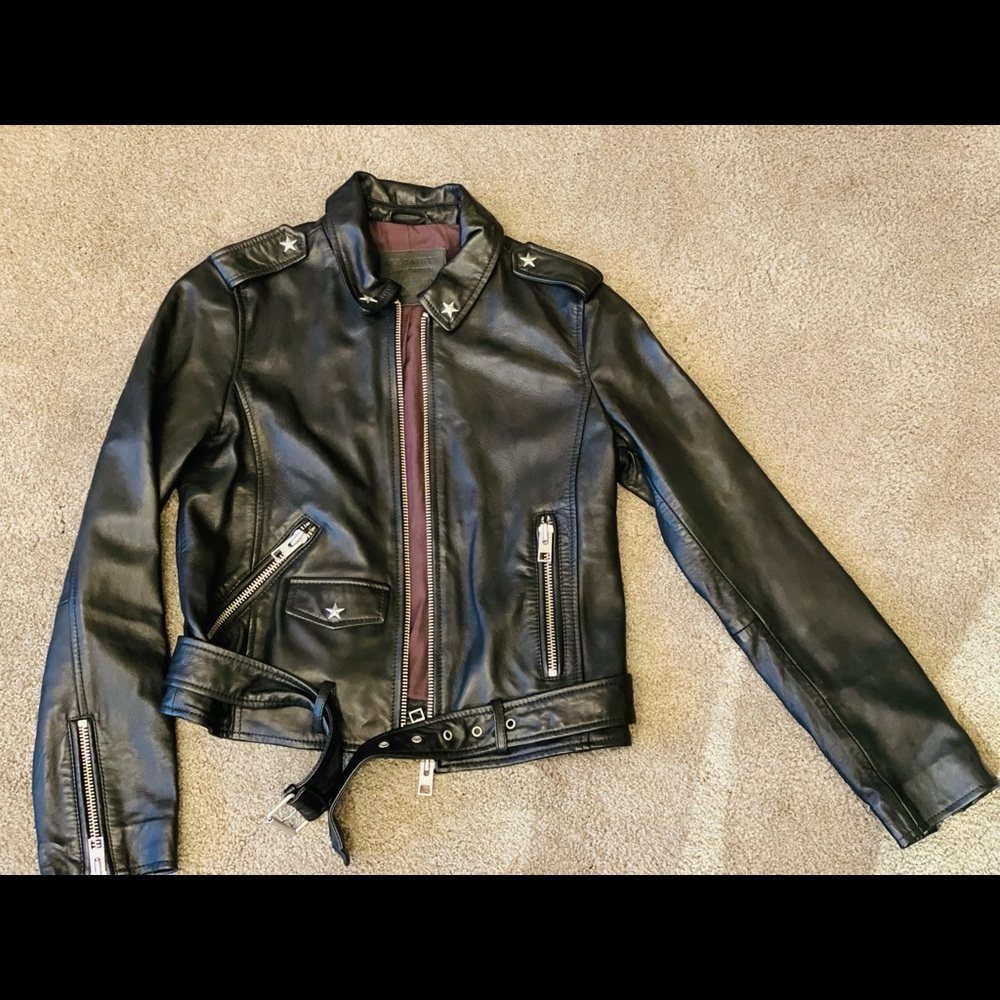 New w/o tags, never worn.  Buttery soft, quality leather - just too edgy for me.